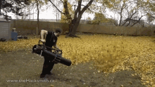 Man with a leaf blower